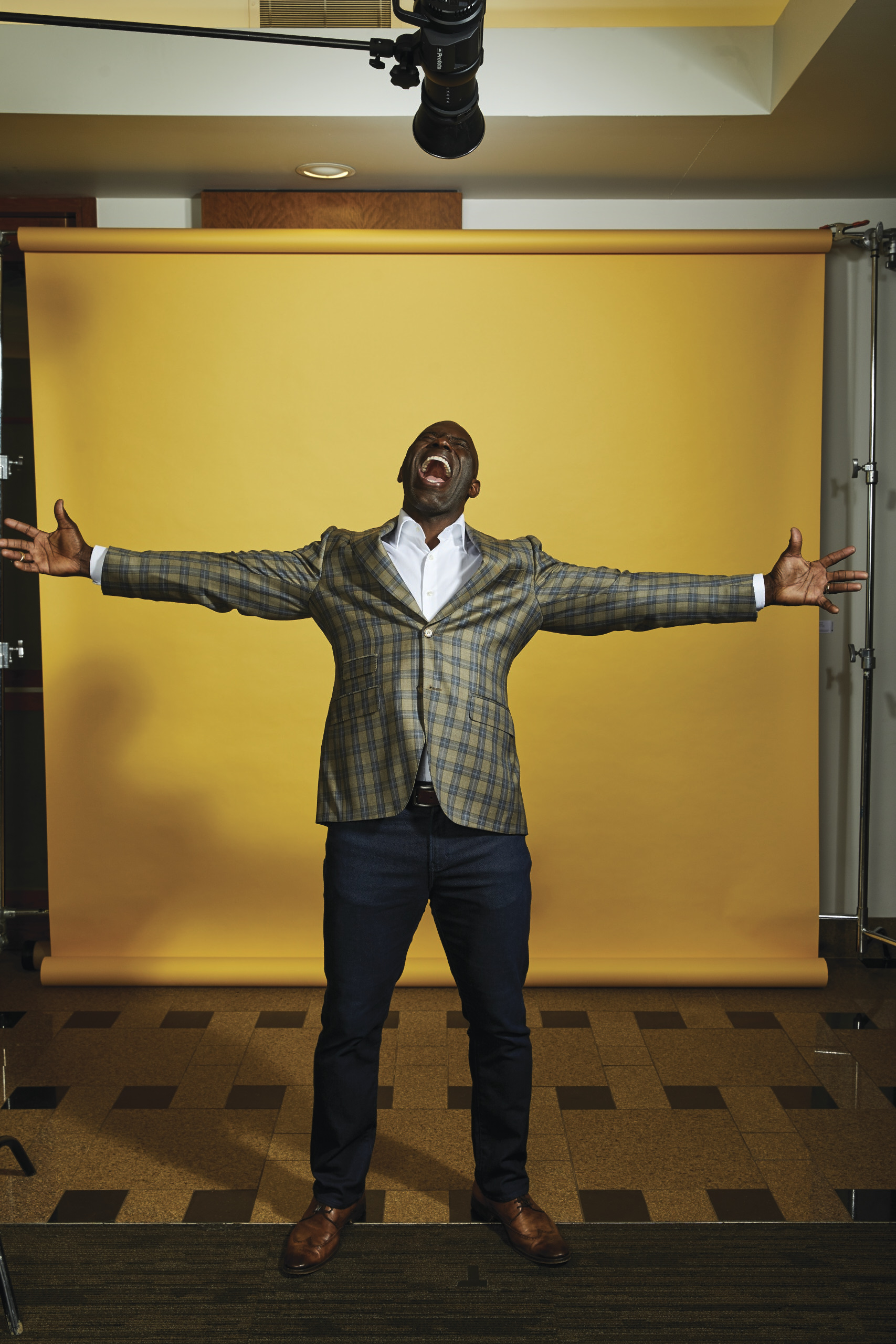 Terrell Davis on yellow background